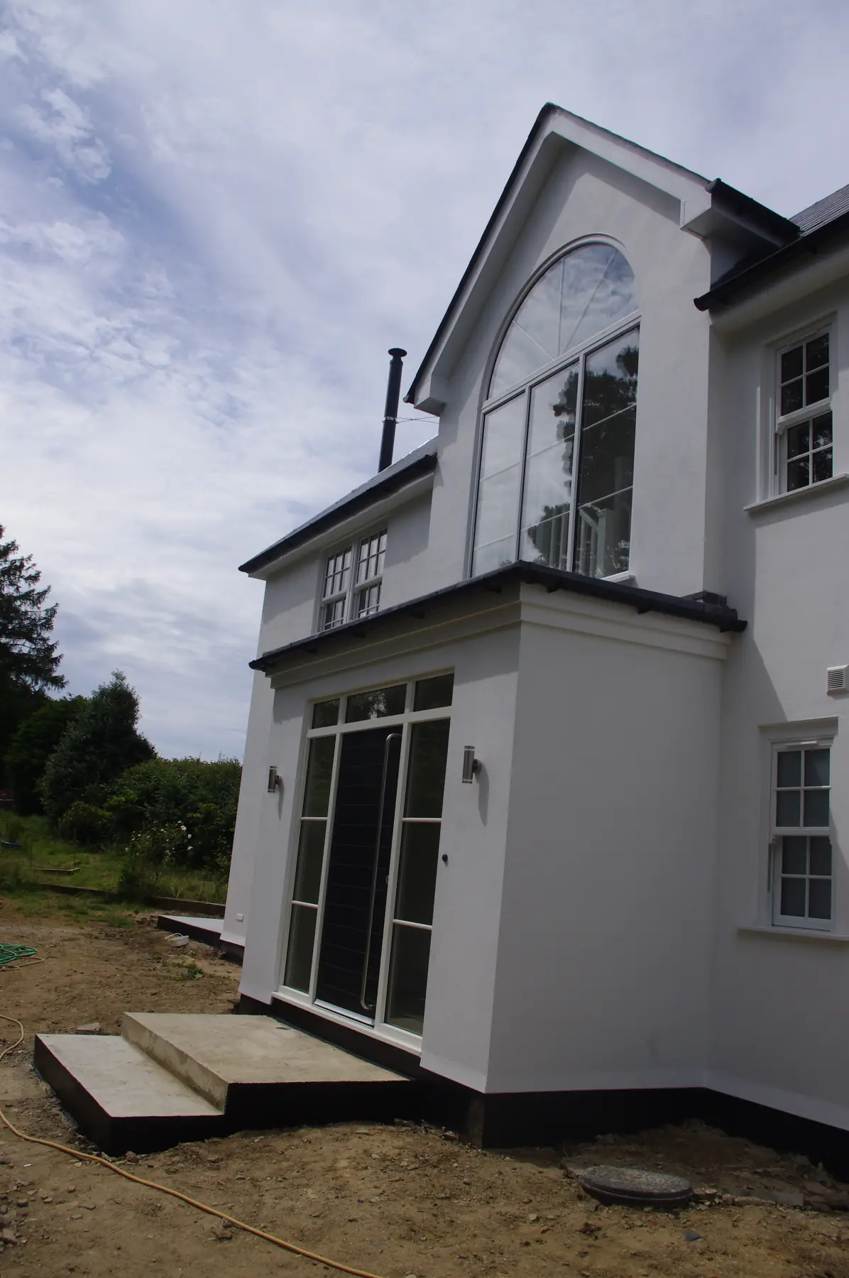 Side and rear of the extended house