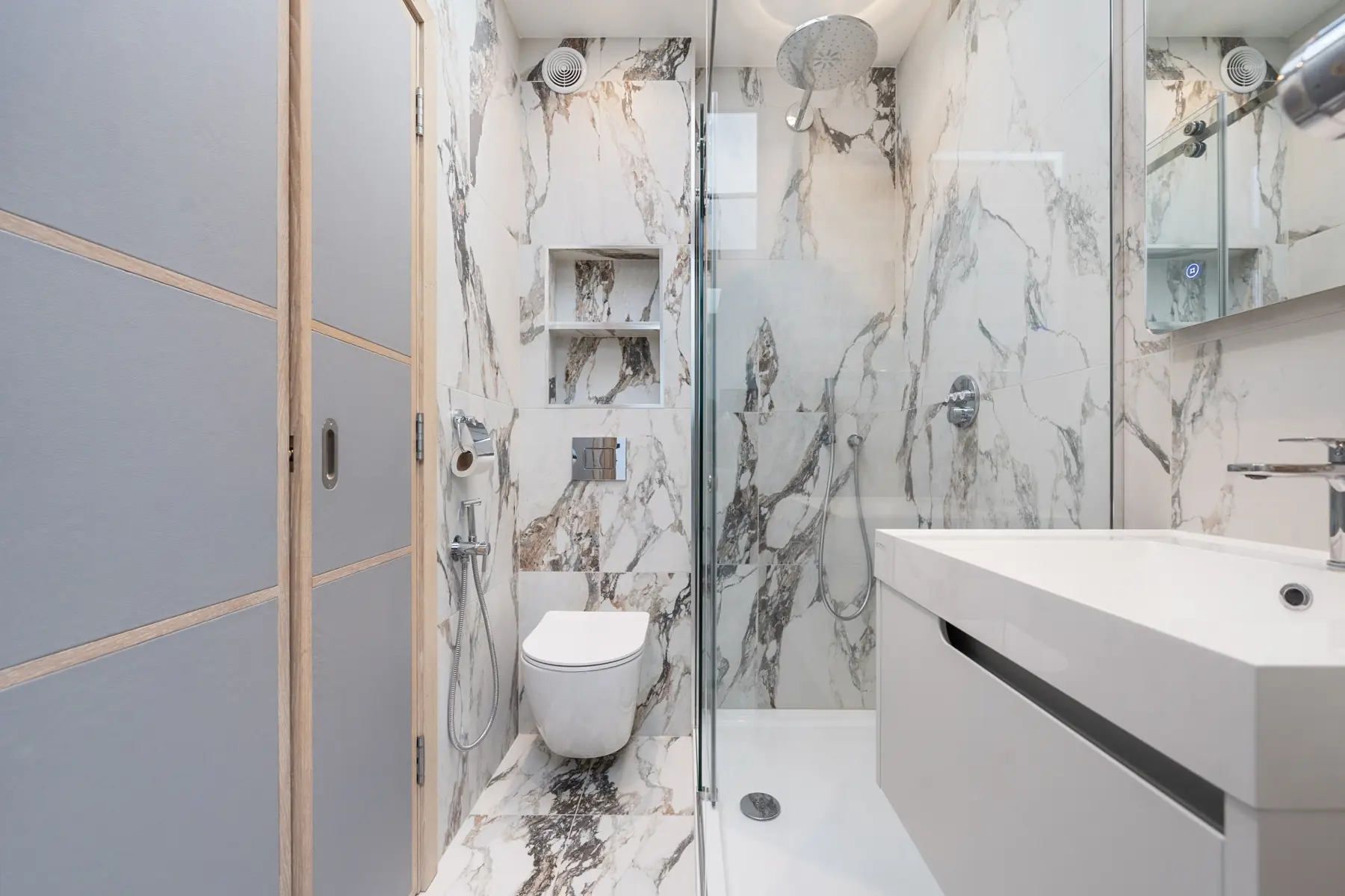 Marble shower room with wall-hung WC