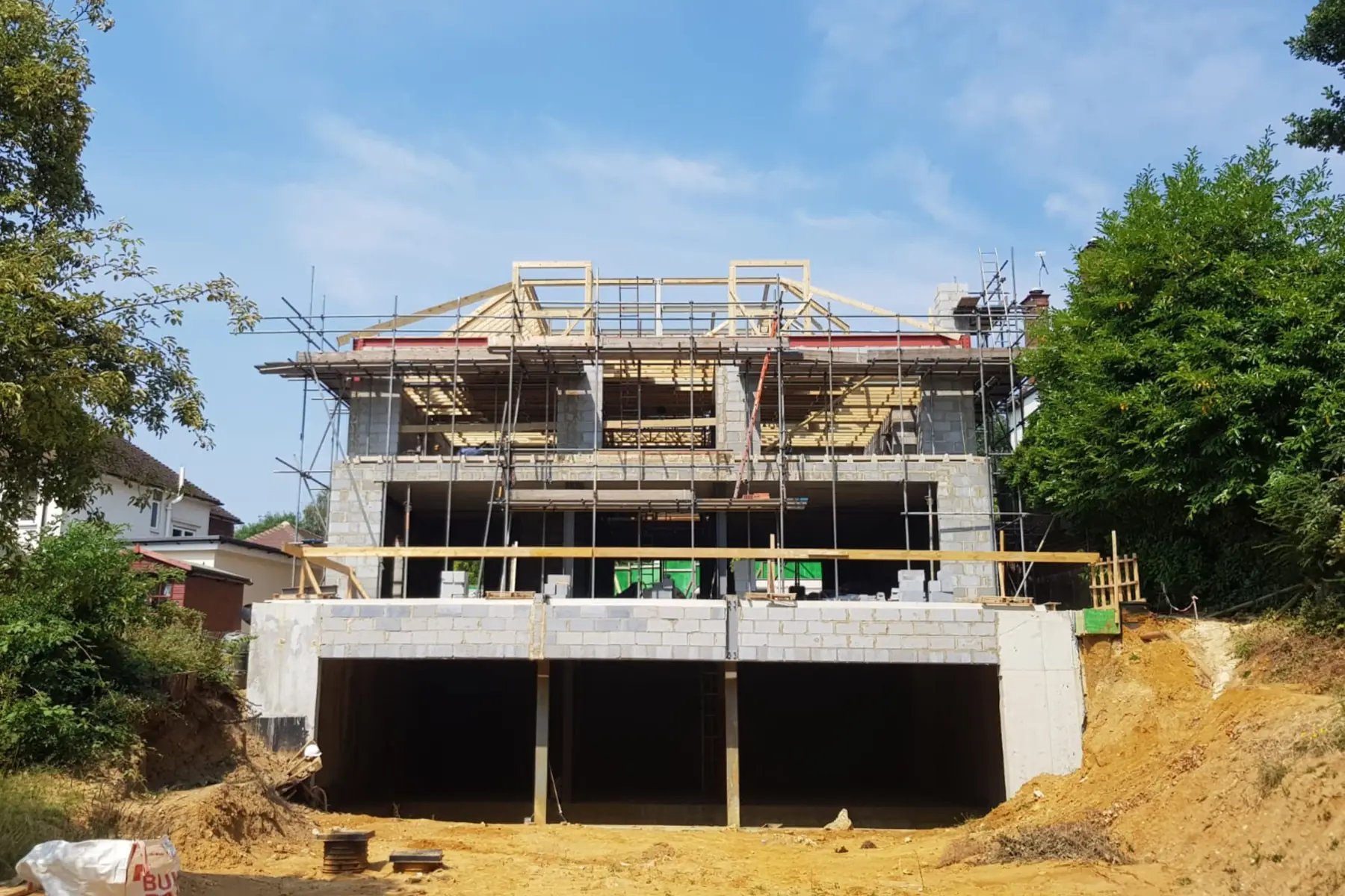 Blockwork shell and scaffolding during construction