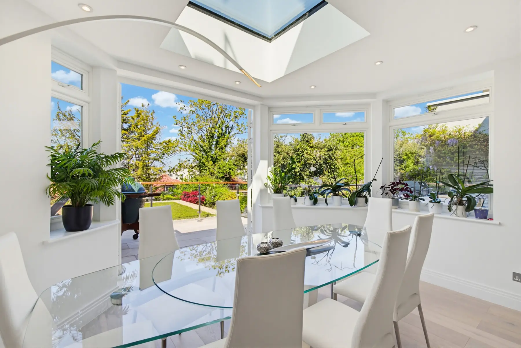 Glazed garden room with roof lantern in a Hampstead extension