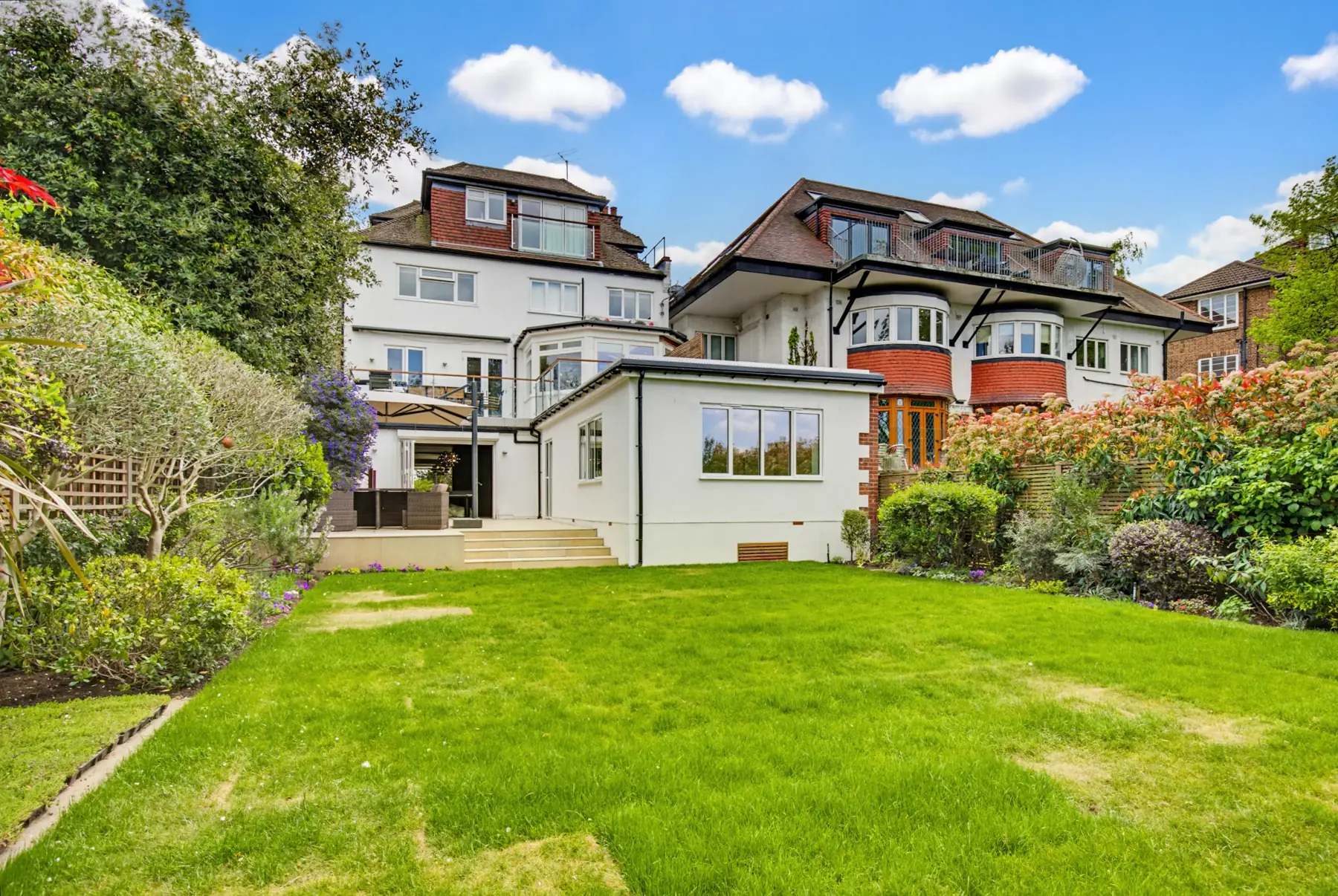 Rear of the house with the new extension and garden